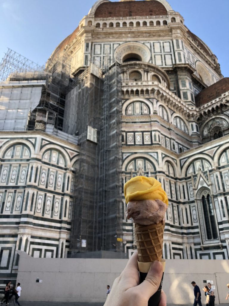 gelato with two flavours with the Florence Duomo in the background